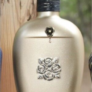Reclaimed liquor bottle. One of a kind. Elegant Gold Bottle with Floral Design